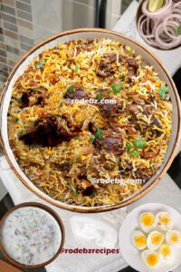 Authentic Mughlai biryani, Dum mutton biryani recipe, How to make Mughlai biryani, Indian royal biryani recipe, lamb mutton biryani, Layered biryani recipe, Mughlai cuisine biryani, Mughlai mutton biryani, Mughlai mutton biryani recipe, Mutton biryani with yogurt marinade, Saffron mutton biryani, Traditional Mughlai lamb biryani